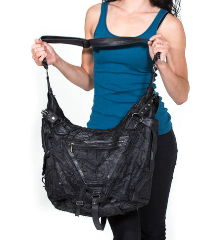 RAGE CAGE Luxe Black Leather Hobo Bag with Unique Cage Strap Design and Versatile Pockets